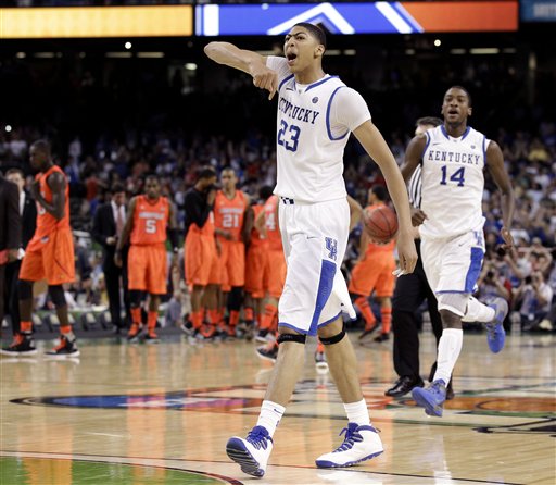 Kentucky forward Anthony Davis (23) reacts after defeating Louisville 69-61 in an NCAA Final Four semifinal college basketball tournament game Saturday, March 31, 2012, in New Orleans. (AP Photo/Charlie Neibergall)