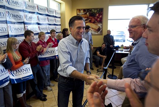Republican presidential candidate Mitt Romney greets people during a campaign stop at a Cousins Subs fast food restaurant in Waukesha, Wis., today.