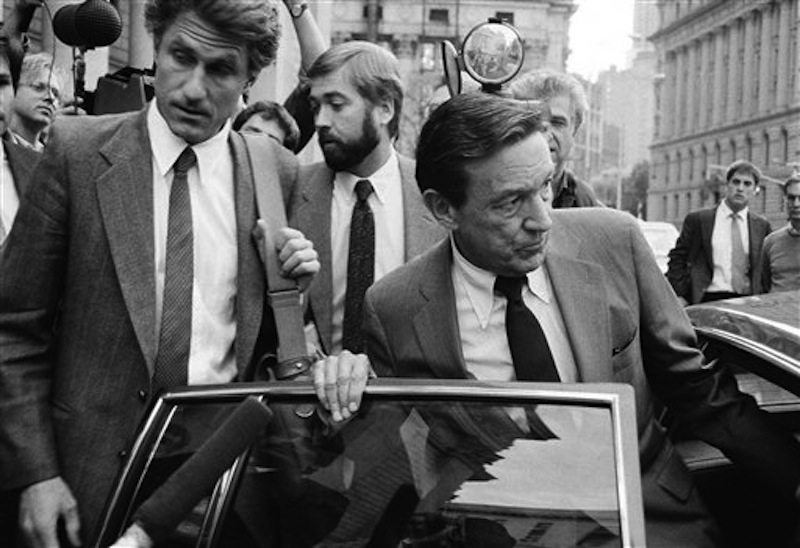 In this Oct. 15, 1984 photo, CBS-TV Correspondent Mike Wallace, right, and producer George Crile, left, leave U.S. District Court in New York, after attending the trial of a libel suit brought by former Gen. William C. Westmoreland against CBS -TV. Wallace, the dogged, merciless reporter and interviewer who took on politicians, celebrities and other public figures in a 60-year career highlighted by the on-air confrontations that helped make "60 Minutes" the most successful primetime television news program ever, has died. He was 93. (AP Photo/Mario Suriani) Mike Wallace