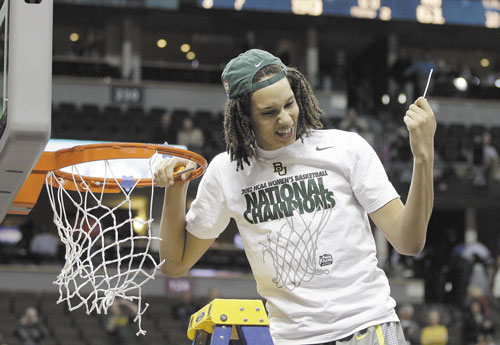 ALL RIGHT: Baylor center Brittney Griner (42) cuts the net down after the Bears won the NCAA women’s championship Tuesday in Denver.