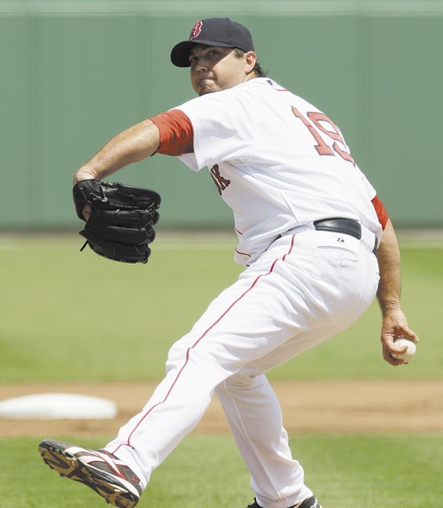STAYING BEHIND: Boston Red Sox manager Bobby Valentine said pitcher Josh Beckett has a thumb injury and had it checked out Monday, but expected him to start the season Saturday against the Detroit Tigers.