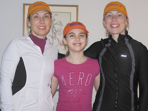 FOR A CAUSE: Crystal White and Heather Peel, left, and right, will run in the Boston Marathon on April 16 in honor of White’s daughter Tigerlily, who was born with biliary atresia, a rare liver disease.