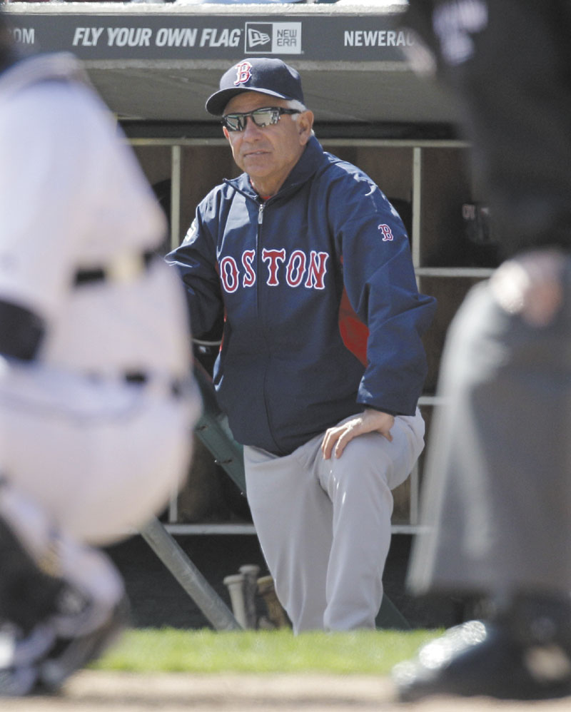 BACK IN THE BIGS: Boston Red Sox manager Bobby Valentine looks out from the dugout during the Red Sox’ season opener against the Detroit Tigers on Thursday in Detroit, Thursday.