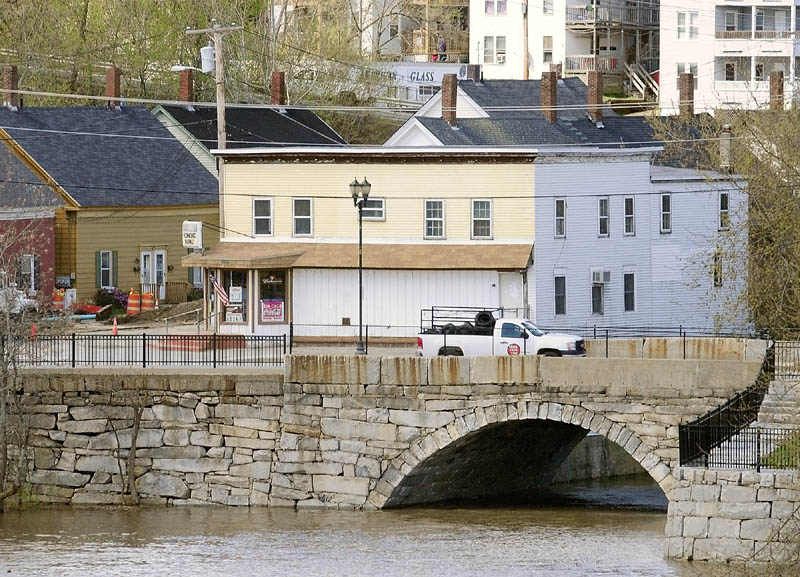 This granite bridge on the shores of the Kennebec River carries Water Street over the Bond Brook in Augusta. The bridge, which is north of downtown and is located between Bond Street and Mill Park, is one of two key city bridges that state officials are now saying are in structural danger during flooding.