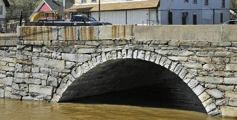 This granite bridge on the shores of the Kennebec River carries Water Street over Bond Brook in Augusta. It is north of downtown and is located between Bond Street and Mill Park.