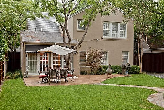 Dallas home for sale features an inviting back patio.