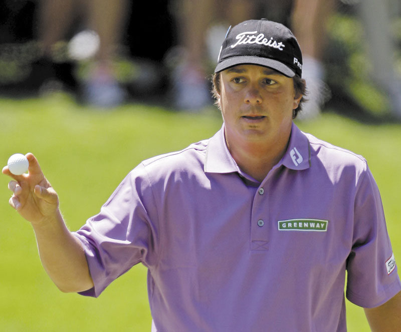 THANKS: Jason Dufner holds up his ball after a birdie on the 16th hole during the second of round the Masters on Friday in Augusta, Ga.