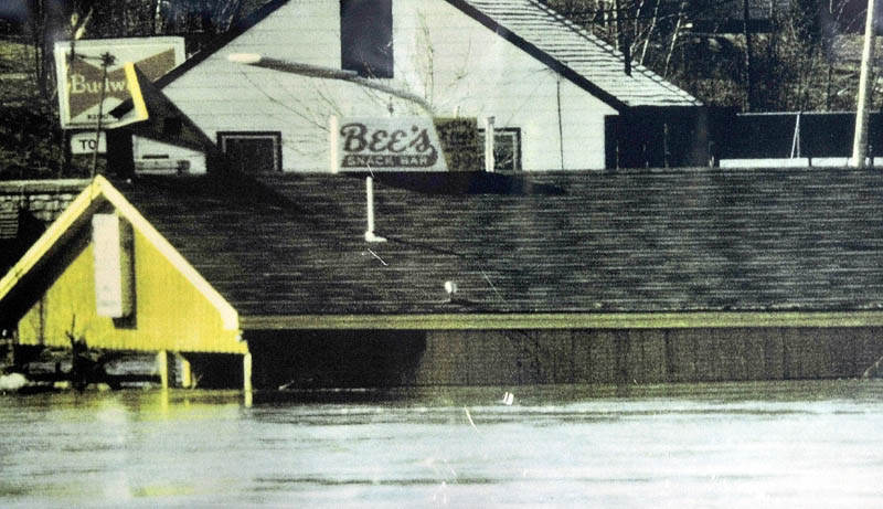 HIGH WATER: This photograph was taken of Bee's Snack Bar in Winslow at the height of floodwater during the flood of 1987. The business survived the flood that swept away seven nearby homes on Lithgow Street.
