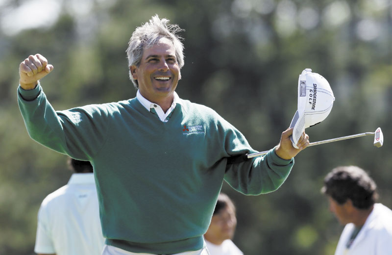 ANOTHER RUN: Fred Couples celebrates after finishing the second round of the Masters on Friday in Augusta, Ga. Couples, 52, shot 5-under 67 and is tied for the lead on the 20th anniversary of his title at Augusta National.