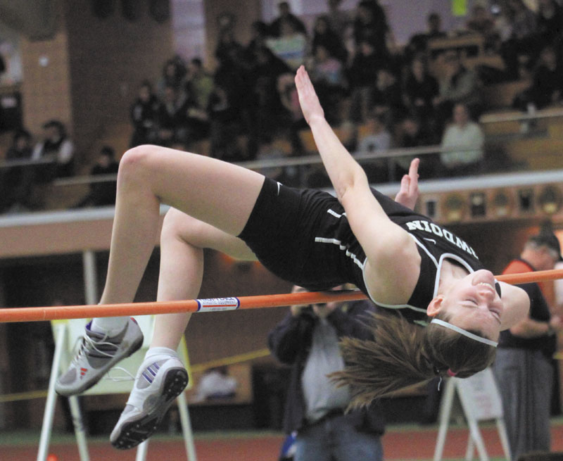 UP AND OVER: Bowdoin College’s Hayleigh Kein won the high jump at the state indoor track and field championship in February with a leap of 5-feet, 2.25-inches.