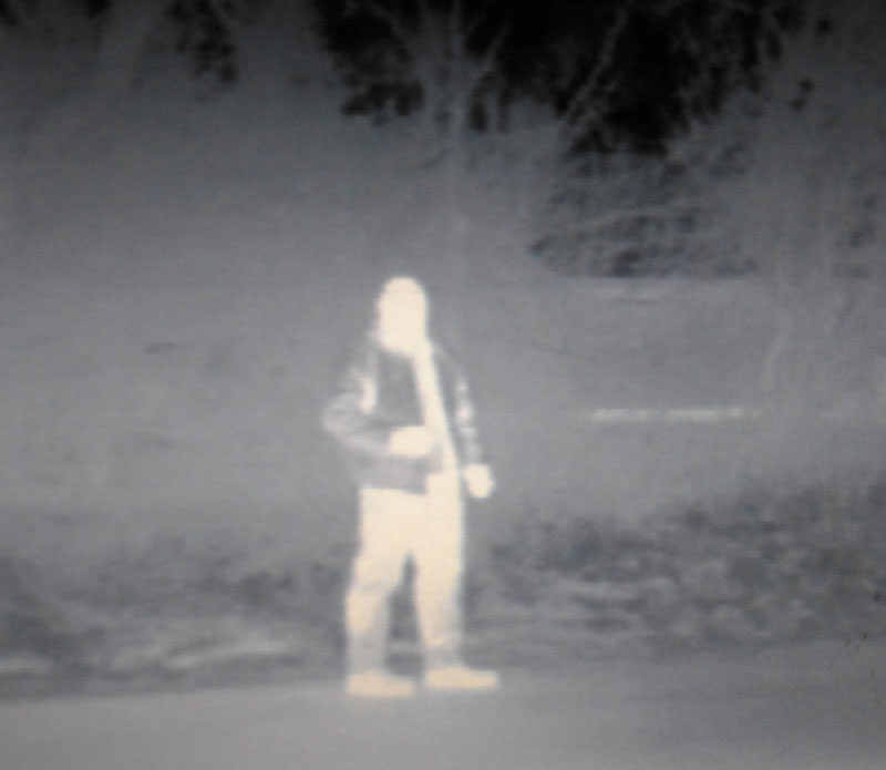 NIGHT EYES: Kennebec County Sheriff's Deputy Mike Dutil is seen through a thermal imaging camera on his cruiser.
