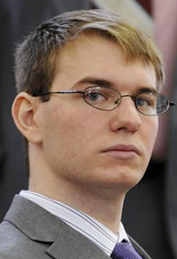 In this April 9, 2012 photo,Thayne Ormsby sits in Superior Court, in Houlton, Maine. Ormsby on trial for the murder of three people told investigators that one of them was a drug dealer responsible for causing pain in his life and that the other two were "perfectly innocent," according to a videotaped interview with police. (AP Photo/The Bangor Daily News)