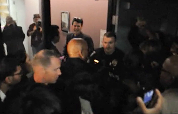 Image from video of student confrontation at Santa Monica College. Students have been upset over a plan to form a nonprofit foundation to offer core courses for about $600 each, or about four times the current price.