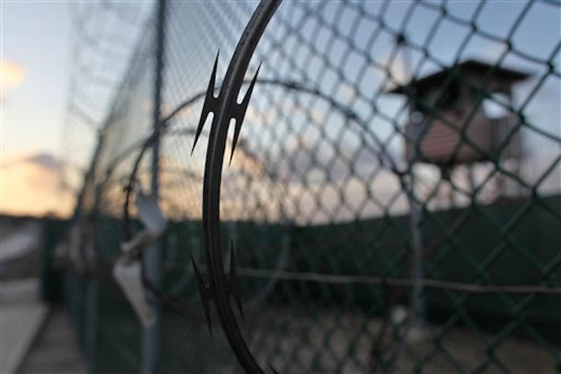 In this May 13, 2009 file photo reviewed by the U.S. military, the sun rises over the Guantanamo detention facility at dawn, at the Guantanamo Bay U.S. Naval Base, Cuba. In a speech Thursday, President Barack Obama defended his plans to close the Guantanamo prison camp. Five men accused of orchestrating the Sept. 11 attacks, including the self-proclaimed mastermind, are headed back to a military tribunal at Guantanamo Bay more than three years after President Barack Obama put the case on hold in a failed effort to move the proceedings to a civilian court and close the prison at the U.S. base in Cuba. (AP Photo/Brennan Linsley, file)