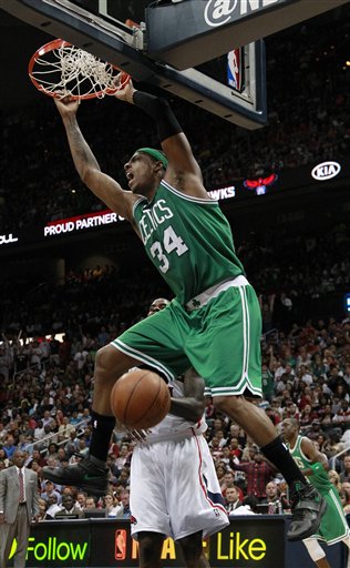 Boston Celtics forward Paul Pierce (34) scores in the second half of Game 2 of an NBA first-round playoff basketball series against the Atlanta Hawks on Tuesday, May 1, 2012, in Atlanta. Boston won 87-80 and evened the series at one game each. (AP Photo/John Bazemore)