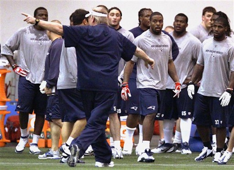New England Patriots rookie defensive backs Alfonzo Dennard (37) and Tavon Wilson (27) are directed to another location by special teams coach Scott O'Brien during NFL football rookie minicamp at the team's facility in Foxborough, Mass., Friday, May 11, 2012. (AP Photo/Stephan Savoia)