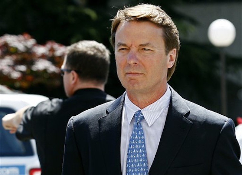 In this April 12, 2012 file photo, former presidential candidate and U.S. Sen. John Edwards arrives outside federal court following a lunch break in jury selection for his criminal trial on alleged campaign finance violations in Greensboro, N.C. (AP Photo/Gerry Broome, File)