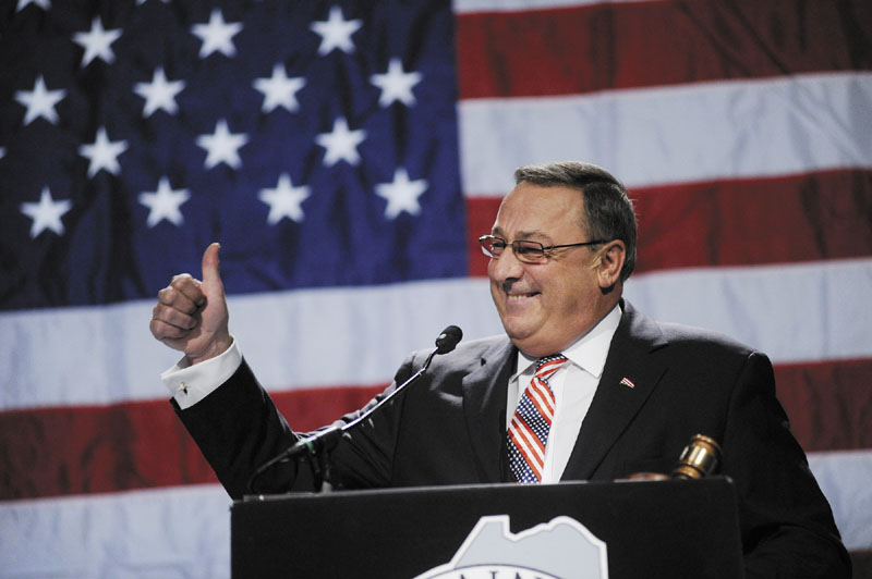 Gov. Paul LePage gives a thumbs up as he speaks during the Maine Republican Party State Convention Sunday,