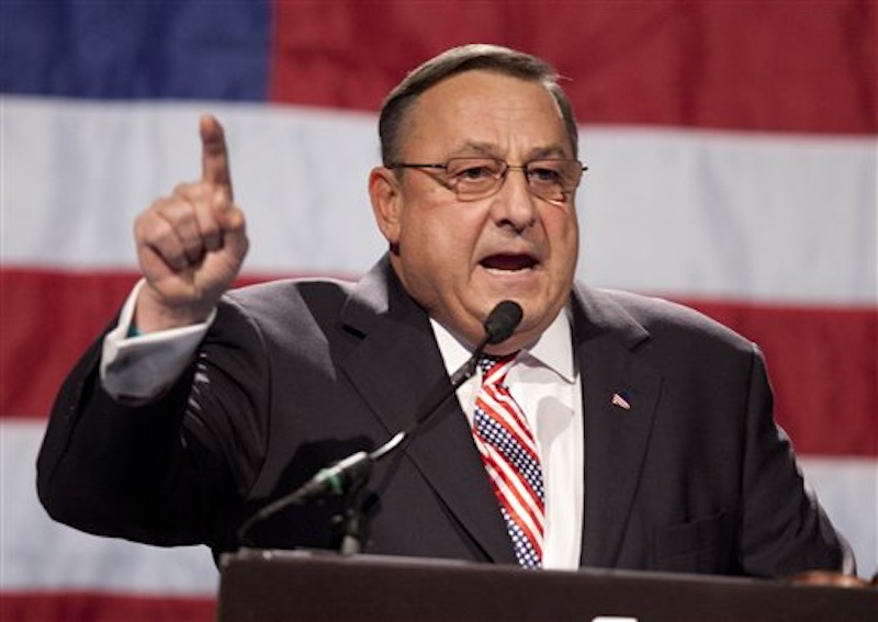 In this file photo made Sunday, May 6, 2012, Gov. Paul LePage speaks at the Maine GOP convention. In his effort to cut state spending, Gov. LePage proposed revamping the state's Medicaid program. Supporters of the cuts say spending is unsustainable and that Maine provides Medicaid coverage to 35 percent more of the population that the national average. (AP Photo/Robert F. Bukaty, File)