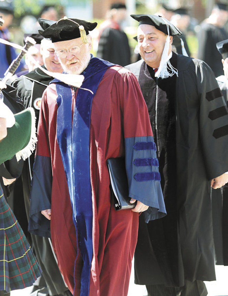 Retiring Thomas College President Dr. George Spann takes part in his final processional just ahead of Gov. Paul LePage at the start of the 118th commencement Saturday in Waterville. Spann served as president for 23 years.