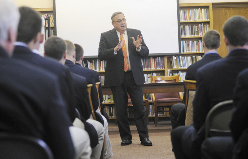 Gov. Paul LePage speaks with Cheverus High School students about domestic violence on Wednesday.