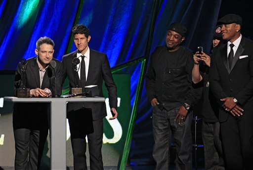 Adam Horovitz, left, and Mike Diamond of the Beastie Boys accept induction into the Rock and Roll Hall of Fame on April 14 in Cleveland. Adam Yauch, who died today of cancer, was absent from the ceremony.