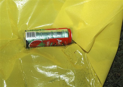This Feb. 26, 2012, photo released by the Florida State Attorney's Office shows a can of Arizona Watermelon Fruit Juice Cocktail at the scene where Trayvon Martin was shot by neighborhood watch volunteer George Zimmerman.