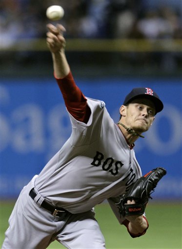 Boston Red Sox starting pitcher Clay Buchholz delivers in the first inning to a Tampa Bay Rays batter during a baseball game Wednesday, May 16, 2012, in St. Petersburg, Fla. (AP Photo/Chris O'Meara)