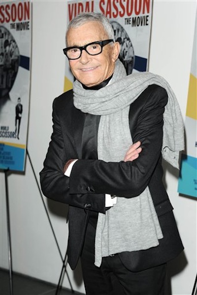In this Feb. 9, 2011 file photo released by Starpix, hair designer and businessman, Vidal Sassoon, stops for a photo at a special screening of "Vidal Sassoon: The Movie,î in New York. Sassoon, whose 1960s wash-and-wear cuts freed women from endless teasing and hairspray died Wednesday, May 9, 2012, at his home. He was 84. (AP Photo/Starpix, Dave Allocca)