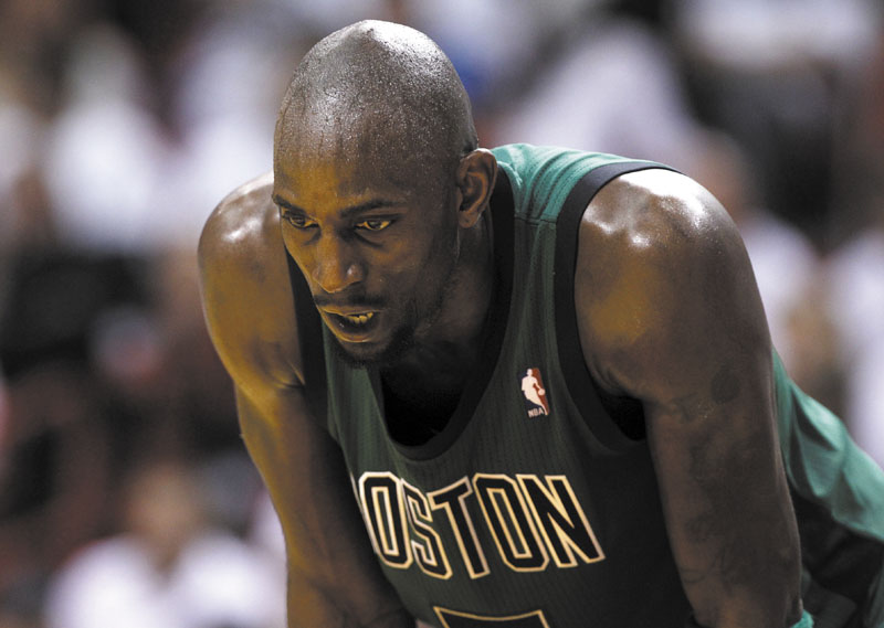 TOUGH NIGHT: Boston’s Kevin Garnett catches his breath during the Celtics’ 93-79 loss to Miami in Game 1 of the Eastern Conference finals Monday in Miami.