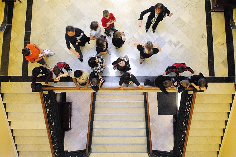 About seven hours after the Legislature adjourned, Rep. Susan E. Morissette, R-Winslow, top right, leads a mid-morning tour of the State House in Augusta for a fifth grade class from Winslow Elementary.