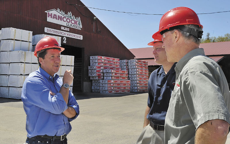 Heading east: Hancock Lumber President Kevin Hancock, left, chats with Matt Duprey, VP Sales and Kevin Hynes, Chief Operating Officer, right, who are going to Japan for a business trip to enhance their overseas exports.