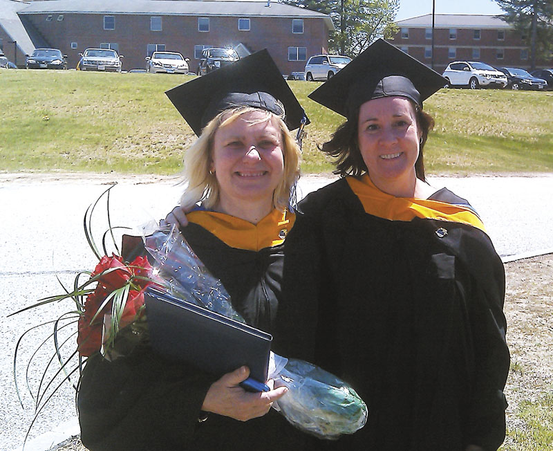 Mary Anderson, left, and Tiffiny Rooney are not only graduates of St. Joseph’s College, they are also cancer survivors. cell phone