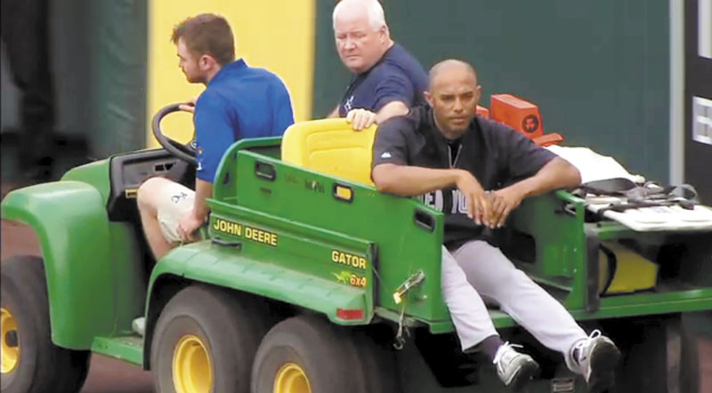 AP photo OUT FOR NOW: In this image taken from video, New York Yankees’ closer Mariano Rivera is carted off the field after twisting his right knee shagging fly balls during batting practice before Thursday in Kansas City, Mo. Rivera tore the ACL in his right knee. The 42-year-old said he will play next season.