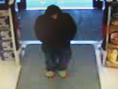 A video surveillance a photo released by police shows the man who robbed an Augusta Rite Aid pharmacy Friday night.