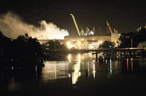 Smoke rises from a dry dock as fire crews respond Wednesday, May 23, 2012 to a fire on the USS Miami SSN 755 submarine at the Portsmouth Naval Shipyard on an island in Kittery. Associated Press photo