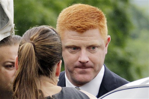 Former Penn State University assistant football coach Mike McQueary, a key witness in the trial of Jerry Sandusky, arrives at the Centre County Courthouse in Bellefonte, Pa., in this June 12 photo.