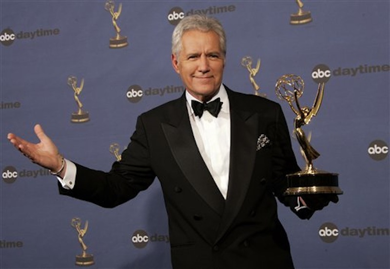 In this Friday, April 28, 2006, file photo, Alex Trebek holds the award for outstanding game show host, for his work on "Jeopardy!" backstage at the 33rd Annual Daytime Emmy Awards in Los Angeles. Sony Television spokeswoman Paula Askanas said Sunday, June 24, 2012, that Trebek is in a Los Angeles hospital recovering from a mild heart attack. (AP Photo/Reed Saxon, File)
