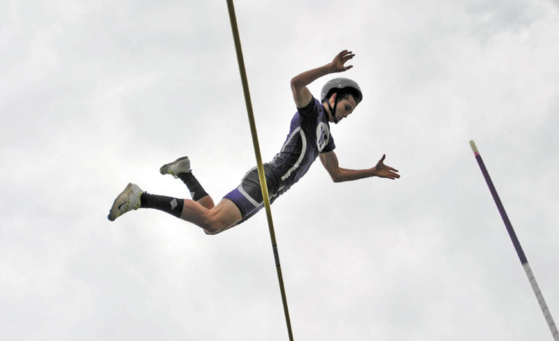 Waterville Senior High Schools Devin Burgess, clears 11 feet in the poll vault event at the 2012 State Class B Track & Field Championship Meet at Mount Desert Island High School Saturday.