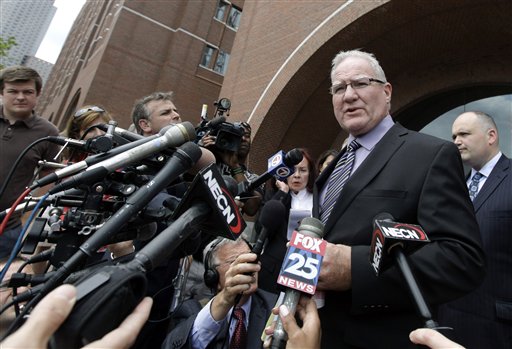 Defense attorney Kevin Reddington speaks to media outside federal court in Boston Tuesday, June 12, 2012, after Catherine Greig, who spent 16 years on the run with former Boston mobster James "Whitey" Bulger, was sentenced to 8 years in prison for helping to hide one of the FBI's Ten Most Wanted Fugitives. (AP Photo/Elise Amendola)