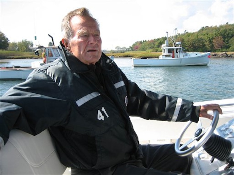 This undated image released by HBO shows former President George H.W. Bush on his boat in Kennebunkport, Maine during the filming of the documentary "41," premiering Thursday, June 14, at 9:00 p.m. EST on HBO. (AP Photo/HBO, Jeffrey Roth)