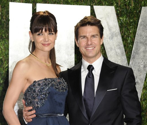 Actors Tom Cruise and Katie Holmes arrive at the Vanity Fair Oscar party, in West Hollywood, in this Feb. 26, 2012, photo.