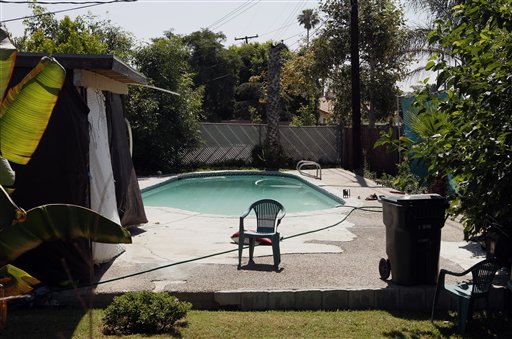 The swimming pool at Rodney King's home is seen in Rialto, Calif., Sunday, June 17, 2012. King, the black motorist whose 1991 videotaped beating by Los Angeles police officers was the touchstone for one of the most destructive race riots in U.S. history, died Sunday. He was 47. King's fiancee called police to report that she found him at the bottom of the swimming pool at their home in Rialto, Calif,, police Lt. Dean Hardin said. (AP Photo/Jae C. Hong)