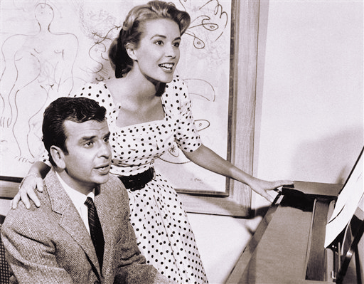 This Sept. 8, 1961, photo shows Richard Adler, left, and his wife, actress-singer Sally Ann Howes, in New York.