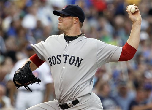 Boston Red Sox starter John Lester delivers a pitch against the Chicago Cubs during the second inning of an interleague baseball game in Chicago, Saturday, June 16, 2012. (AP Photo/Nam Y. Huh)