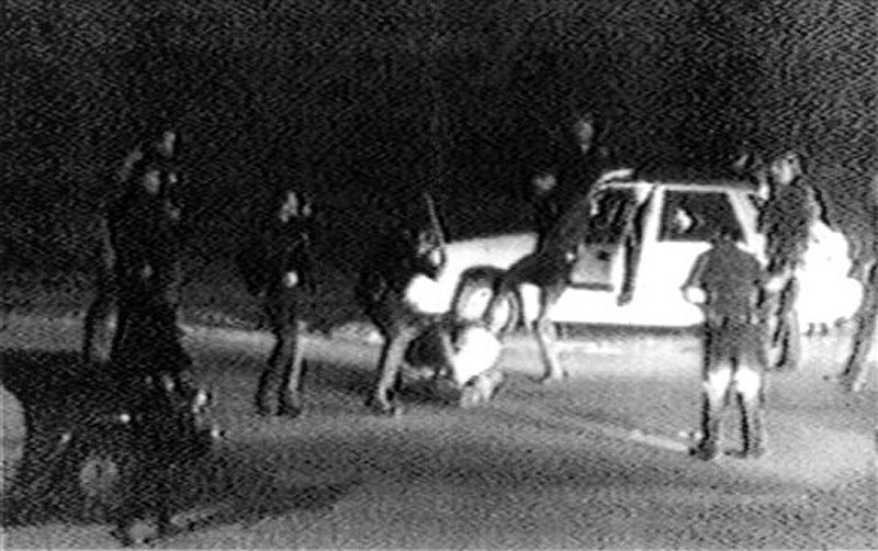 This March 31, 1991 image made from video shot by George Holliday shows police officers beating a man, later identified as Rodney King. King, the black motorist whose 1991 videotaped beating by Los Angeles police officers was the touchstone for one of the most destructive race riots in the nation's history, has died, his publicist said Sunday, June 17, 2012. He was 47. (AP Photo/Courtesy of KTLA Los Angeles, George Holliday)