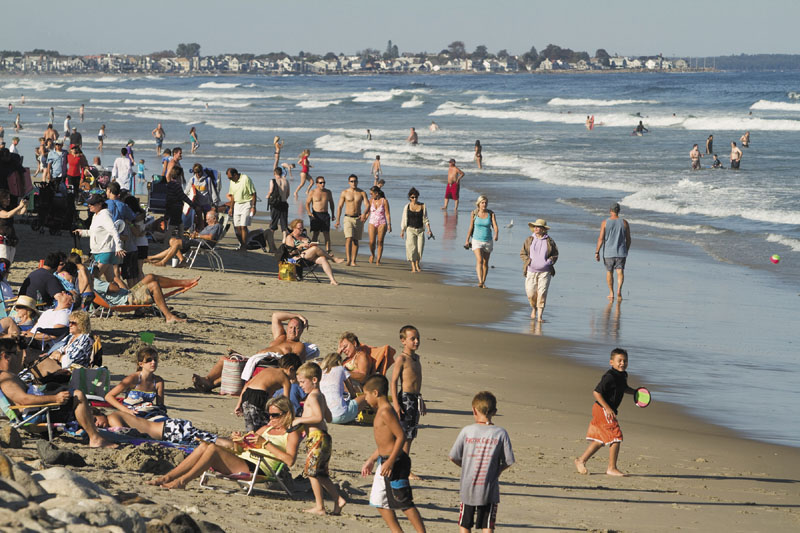 Beachgoers congregate at Ogunquit Beach in this September 2011 photo.