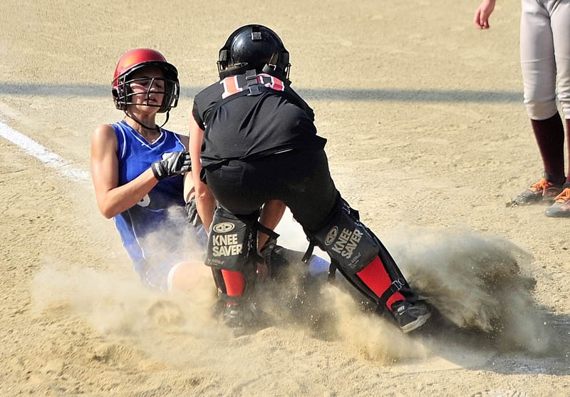 BANG, BANG PLAY: Sacopee Valley’s Chelsey Burnell, left, is tagged out at the plate by Ashland catcher Brooke LaBelle during the Class C/D Senior High School All-Star game Thursday evening at Cony Family Field in Augusta