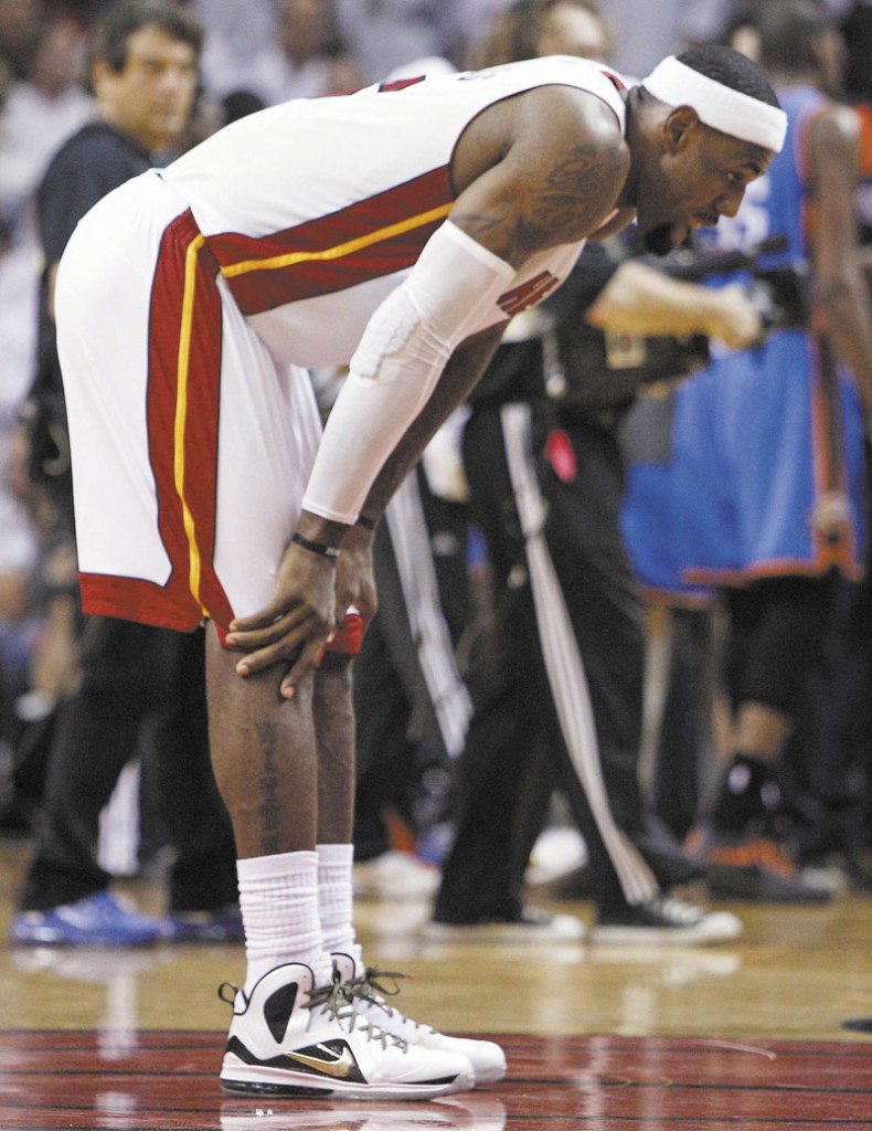 HURTING: LeBron James missed parts of the fourth quarter of Game 4 of the NBA Finals because of leg cramps. James will continue to receive treatment and plans to play in Game 5 on Thursday.