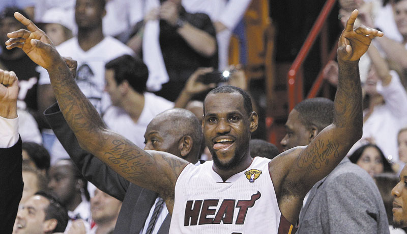 Miami Heat small forward LeBron James (6) reacts in the final moments during the second half at Game 5 of the NBA finals basketball series, Thursday, June 21, 2012, in Miami. The Heat won 121-106 to become the 2012 NBA Champions.(AP Photo/Lynne Sladky)